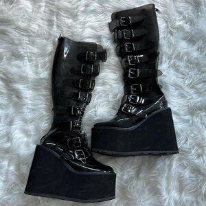 Demonia Swing 815 clear grey pvc platforms